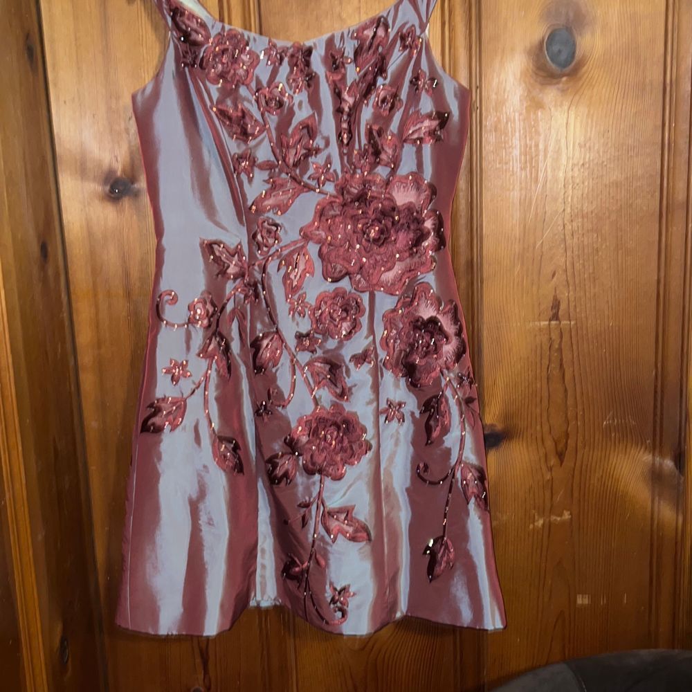 Pageant dress from Claire’s boutique fuchsia and iridescent in color with crysta